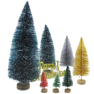 Set of 7 colorful mini Christmas trees with a gold Merry Christmas sign on white background