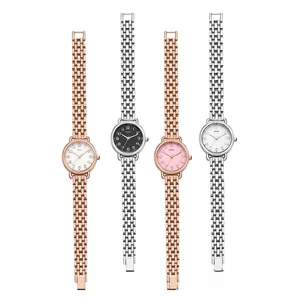 Collection of four slim metal mesh strap quartz watches in silver and rose gold finishes