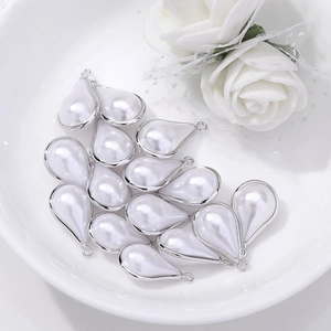 DIY silver-edged pearl waterdrop pendants for handmade jewelry and necklaces
