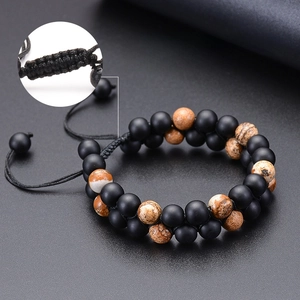Double-layered braided natural stone bracelet with matte black beads and adjustable lock