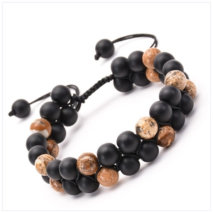 Macro detail of double-layer natural matte stone beads with adjustable woven cord