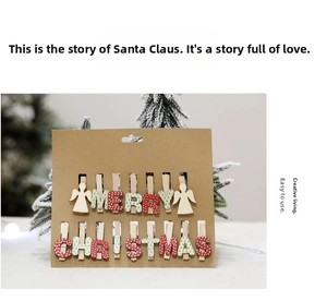 Detail of Christmas wooden clips set with Merry Christmas letters on cardboard