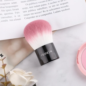 Pinceau maquillage champignon avec poils dégradés roses pour poudre libre et blush