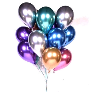 Macro shot of colorful metallic latex balloons in gold, silver, and blue for celebrations