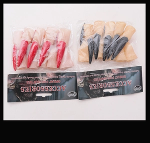 Detail view of red and black Halloween claw finger sets in retail packaging for parties