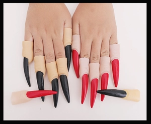 Detail view of 12-piece Halloween long claw finger sets in black and red plastic