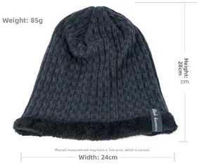 Close-up of knit winter hat with thick black fleece lining and Black Human label detail