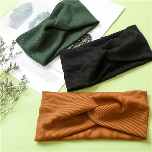 Knitted twist front wide headbands in black, dark green and ginger yellow for women