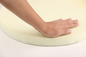 Close-up of soft high-density round foam cushion showing elastic slow rebound feature