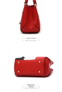 Detail view of red PU leather tote with crocodile pattern base and gold protective studs
