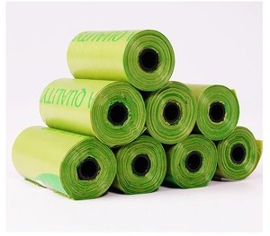 Pyramid stack of eight light green biodegradable pet waste bags with A Quality print