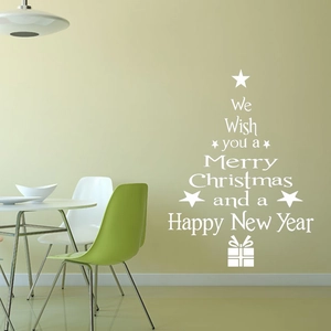 White Christmas tree wall decal with festive typography on a light green wall decor