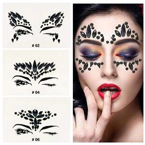 Detailed views of black crystal face jewel stickers in three festive makeup patterns