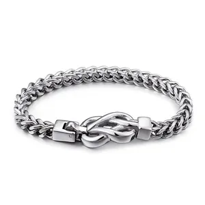 Men's titanium steel dragon bone chain bracelet with central knot and secure clasp