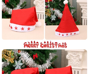 Detail view of red velvet Christmas hat with five-pointed stars and white faux fur trim