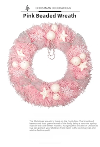 Detail of pink Christmas wreath with white snowballs, silver bows and bead chain