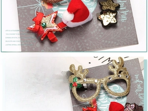 Christmas gift set featuring deer antler glasses with sequins and festive bow hair clips