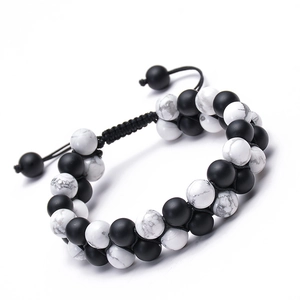 Detailed shot of double-layered beaded bracelet with matte black and white turquoise stones