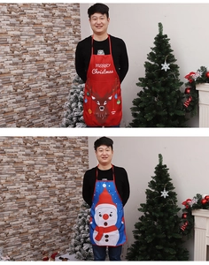 Detail view of adult Christmas aprons featuring red reindeer and blue snowman patterns