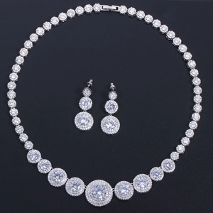 Detailed view of silver bridal jewelry set with micro-pave cubic zirconia gemstones