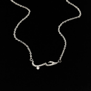 Detail of silver Arabic love calligraphy pendant with micro-pave zircons and round diamond