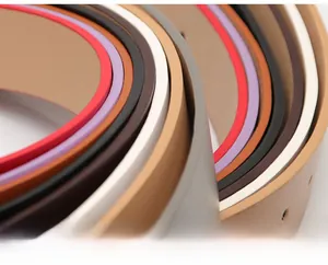 Detail of high-quality leather belts showing premium 8-layer oil edge finishing and texture