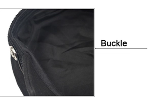 Close-up of black beret side detail featuring a metallic buckle with embossed pattern