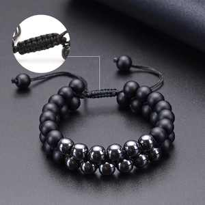 Double-row beaded bracelet with matte and polished stones on adjustable nylon cord