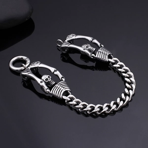 Punk silver stainless steel skull bracelet with thick curb chain and toggle clasp