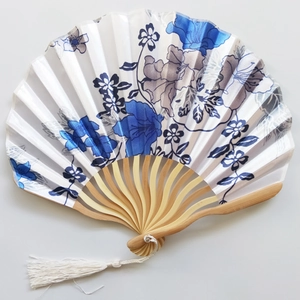 Japanese style white silk folding fan with blue floral patterns and white tassel