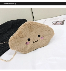 Detailed view of plush cloud bag with embroidery details and golden chain strap