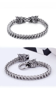 Detail view of the silver dragon head clasp and double-row woven chain for men