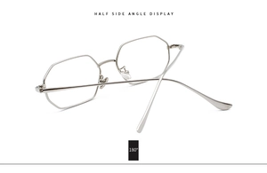 Detailed side view of silver octagonal metal frame sunglasses with sleek temple structure