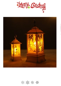 Close-up of vintage LED Christmas lanterns with snowman patterns and warm glowing light
