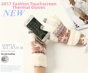 Detail of touchscreen knitting gloves with deer pattern and thick faux fur wrist cuffs