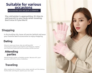 Close-up of pink knit winter gloves with touchscreen fingertips and snowflake pattern