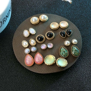 Detailed set of 12 vintage gold-plated stud earrings with pearls and colorful resin stones