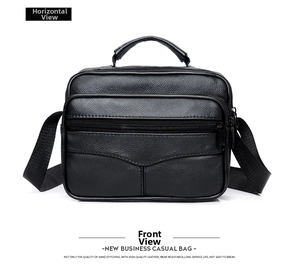 Detail of classic black lychee grain leather briefcase with sturdy top handle and zipper