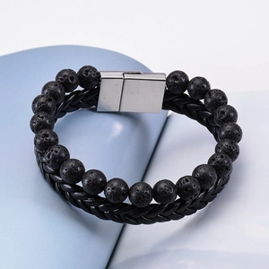 Detail of black lava stone beads and woven leather double-layer bracelet with magnetic clasp
