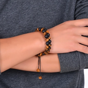Double-layered 8mm tiger eye and matte black bead bracelet with adjustable woven cord