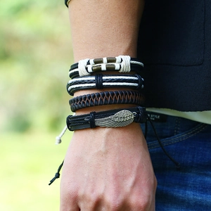 Men's retro braided leather bracelet set with silver metal wing pendant detail