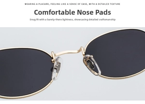 Detail of adjustable clear silicone nose pads on gold metal oval sunglasses for comfort