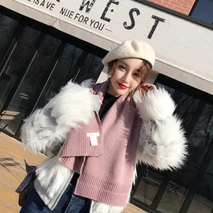 Chic pink knit scarf and beige beret with white faux fur coat for winter warmth