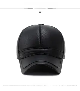 Front view of black PU leather baseball hat featuring textured litchi grain and wide brim