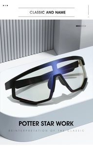 Detail view of photochromic cycling glasses with thick black frame and blue tinted lens