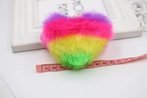 Detailed measurement of colorful rainbow heart plush keychain showing size of 10cm