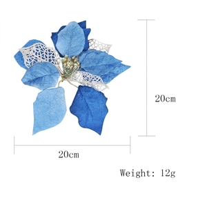 Détail d'un poinsettia de Noël bleu de 20cm avec des paillettes argentées