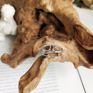 Detailed macro shot of a double-layered 925 sterling silver bamboo joint ring