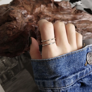 Retro 925 sterling silver bamboo joint ring with layered vintage design on finger