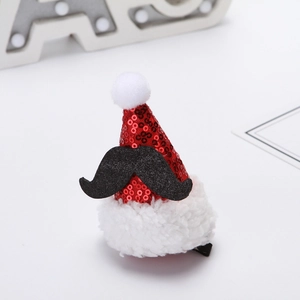 Detail of red sequined mini Santa hat hair clip with white fur trim and black mustache
